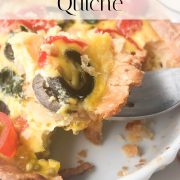A close-up of a single serving Mediterranean quiche on a fork, featuring tomatoes, olives, and a flaky crust, with more Mediterranean quiche in a white dish below. Text overlay reads “Single Serving Mediterranean Quiche.”.